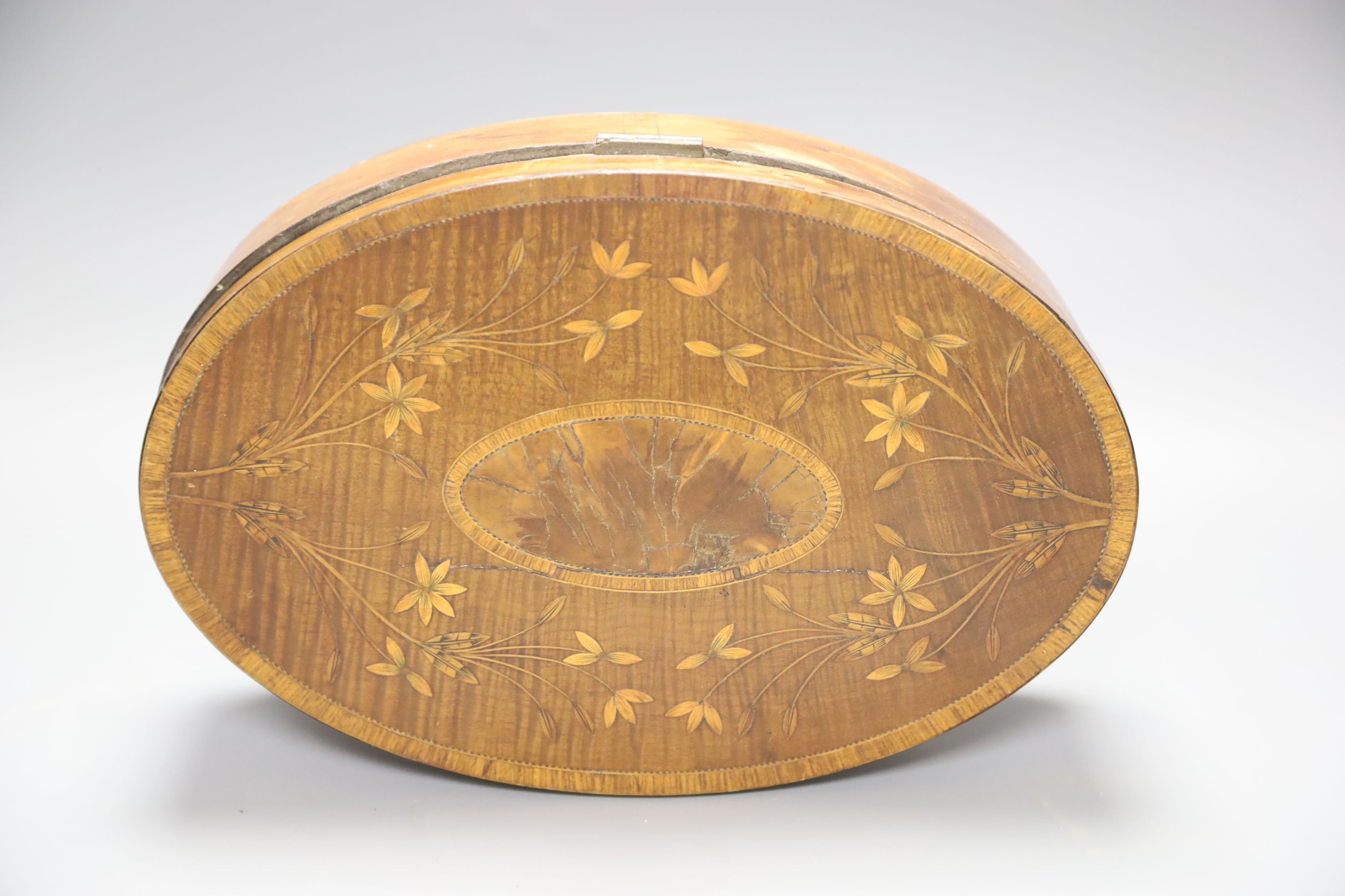 A George III oval marquetry inlaid box, length 29cm